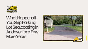 Worn commercial parking lot with cracks and fading in Andover MA